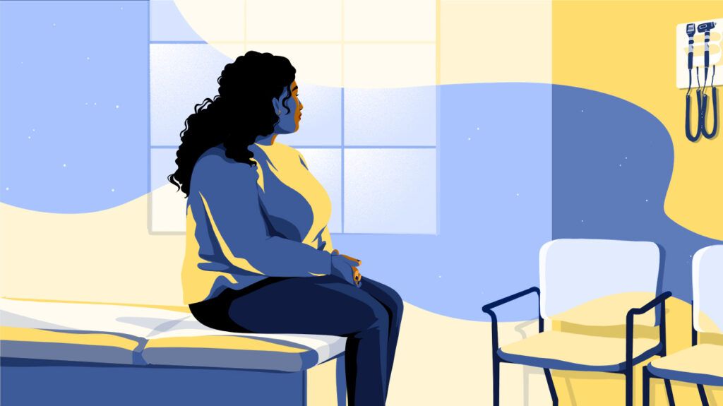 Seated woman looking into space